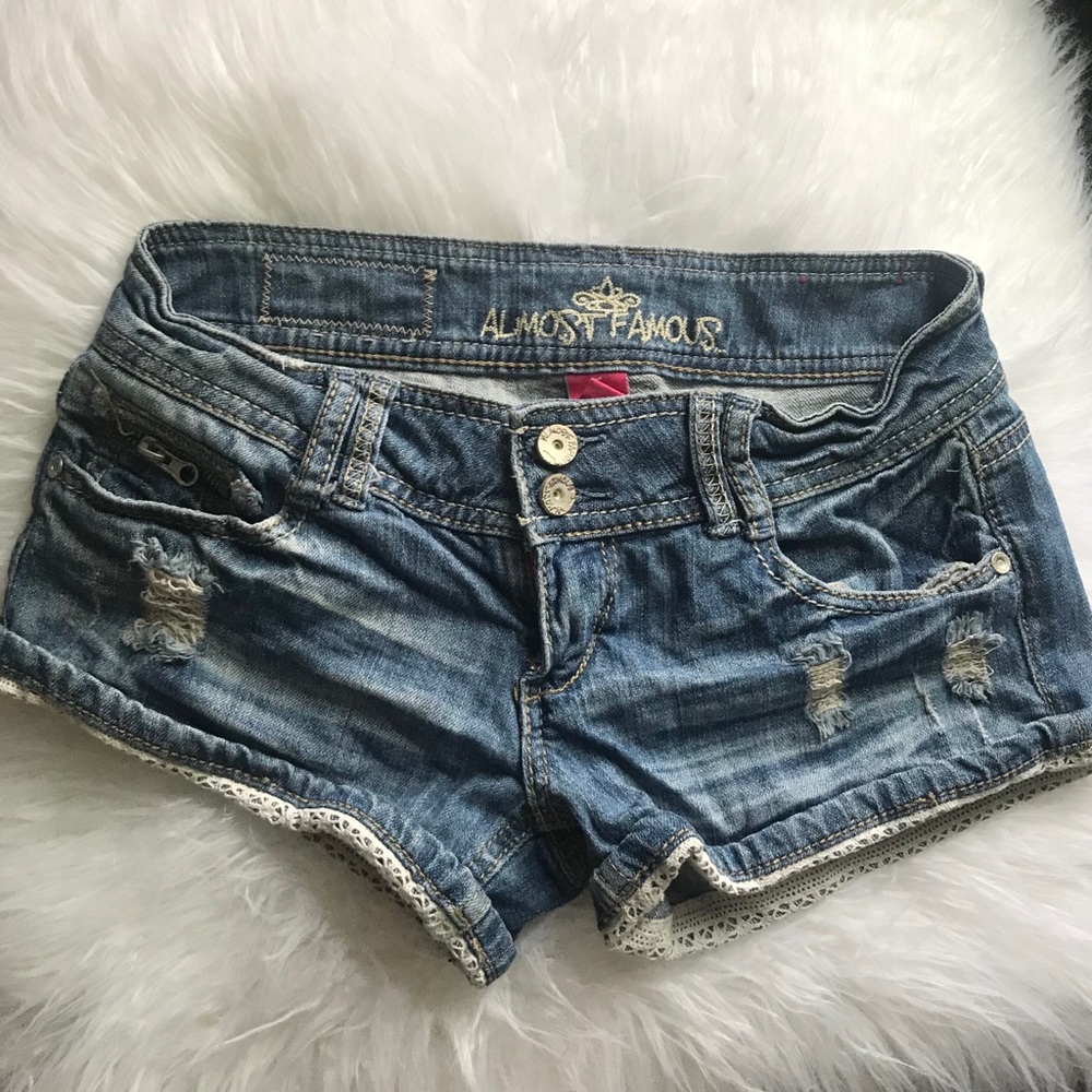 Distressed laced detail shorts!